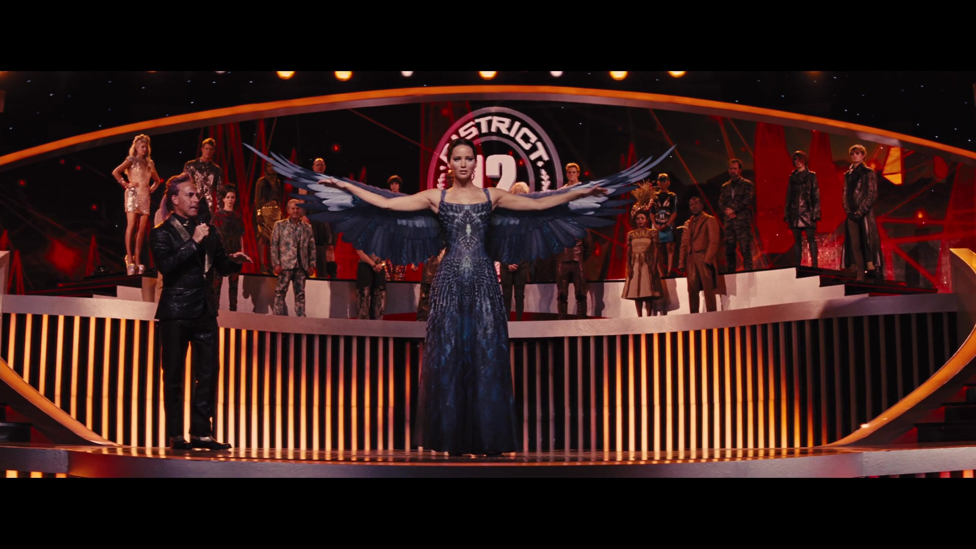 Katniss com o vestido do tordo em Jogos Vorazes Em Chamas