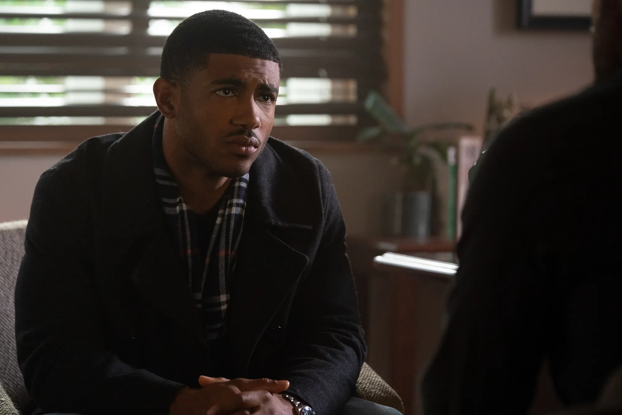 Branden Cook como Evan